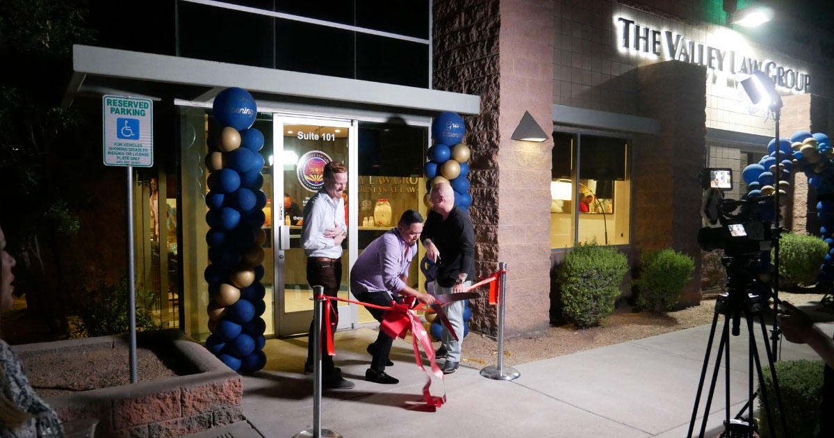 Behind the scenes of the partners cutting the ribbon in front of the Gilbert location.